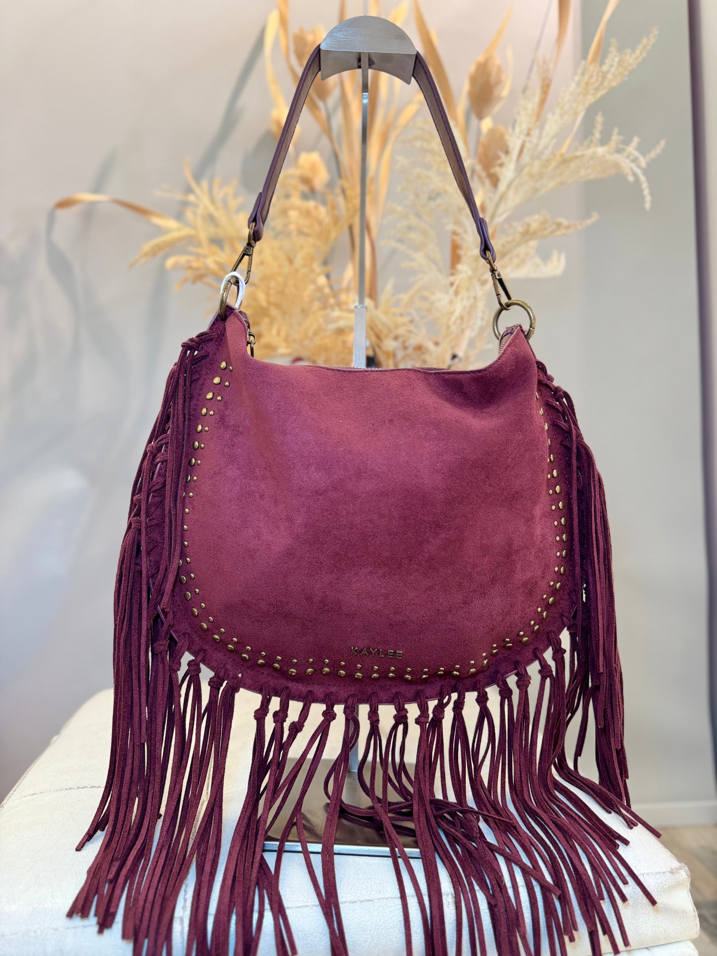 Borsa con frange bordeaux